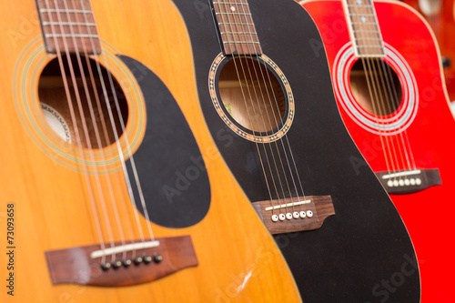Obraz na plátně Close-up of guitars in a music shop