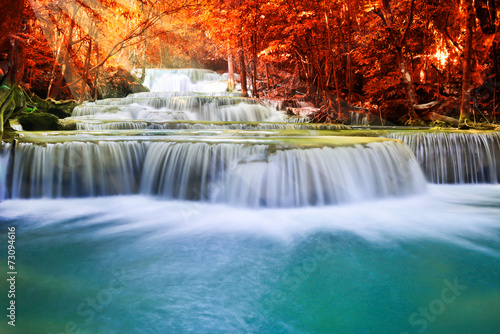 Beautiful waterfall in autumn forest © totojang1977