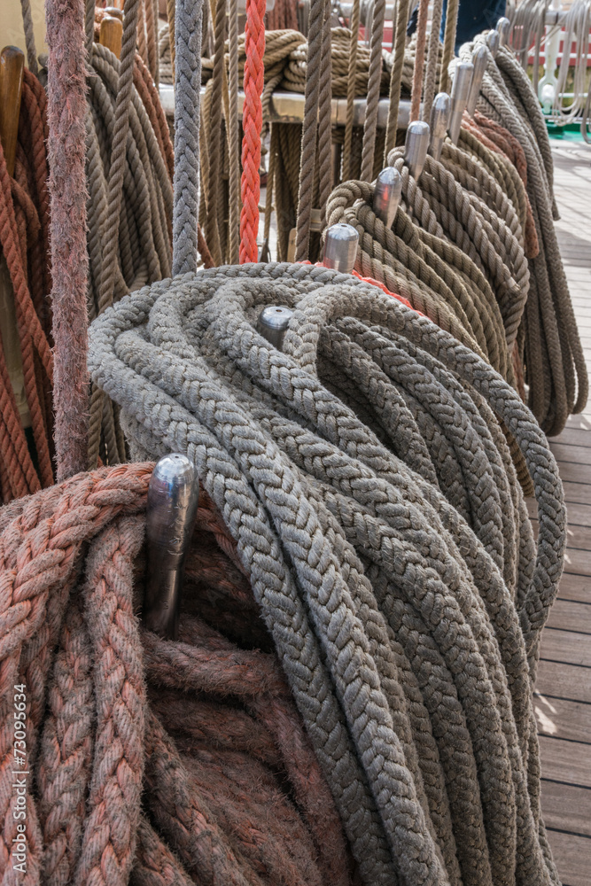 Mast and sail ropes on the deck of a Tall Ship sailing vessel.