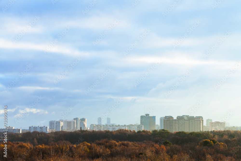 evening blue clouds over city in autumn evening blue clouds over city in autumn