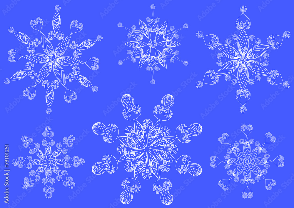 Snowflakes in the technique of quilling .