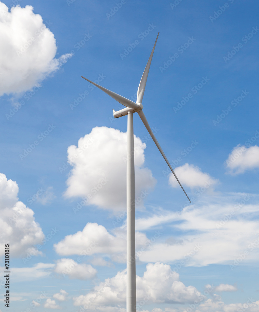 The wind turbine in beautiful cloudy blue sky background, concep The wind turbine in beautiful cloudy blue sky background, concep