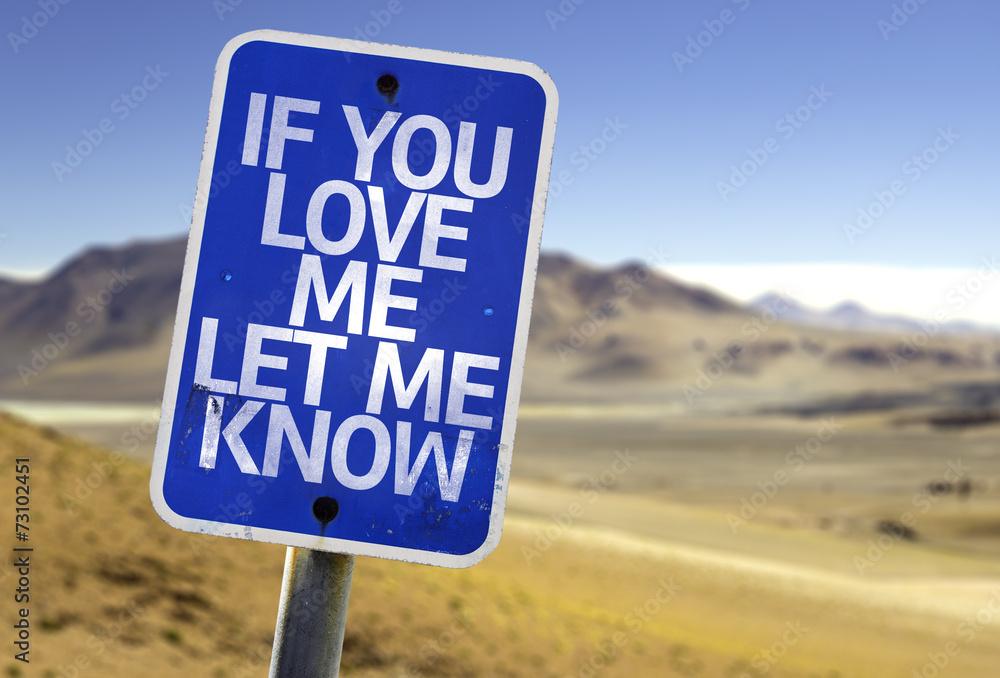 If You Love Me Let me Know sign with a desert background