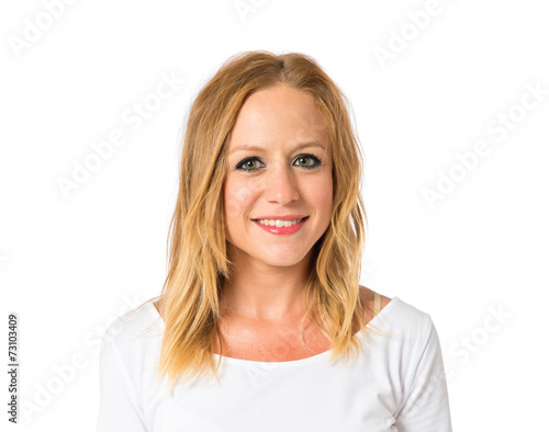 Pretty blonde girl over white background