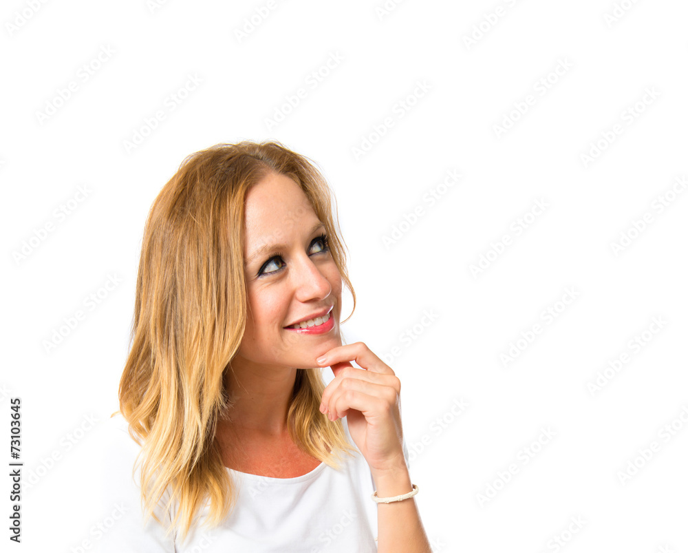 Woman thinking over isolated white background Woman thinking over isolated white background