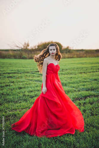 The girl in a red dress 1294. © alenazamotaeva