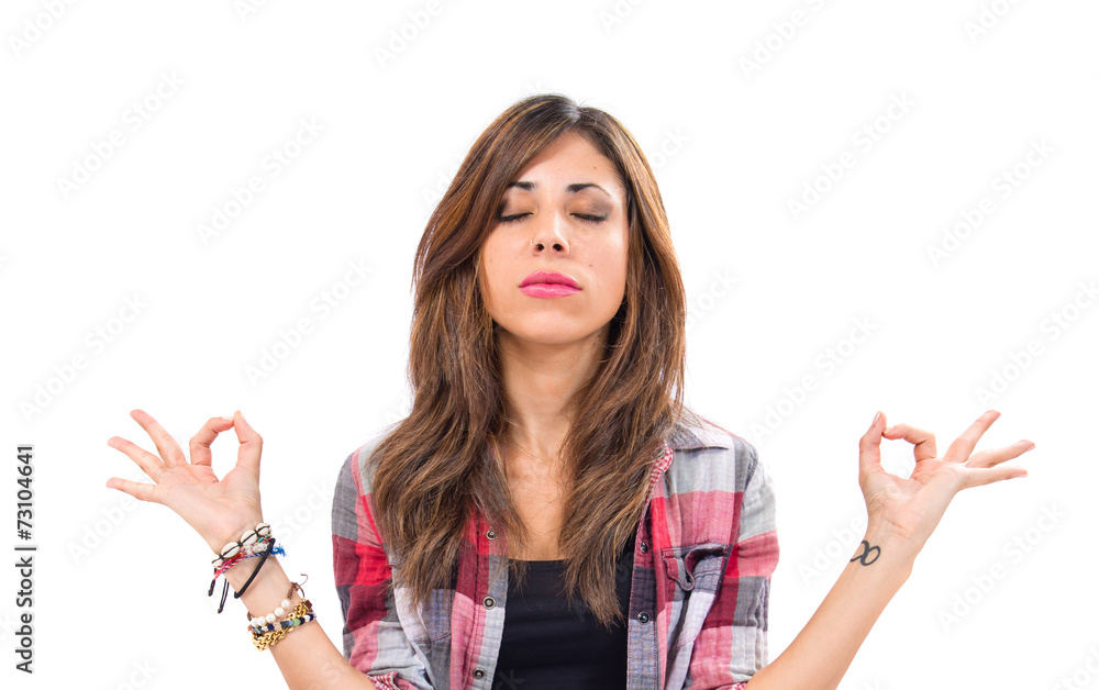 Pretty girl in zen position over white background Pretty girl in zen position over white background