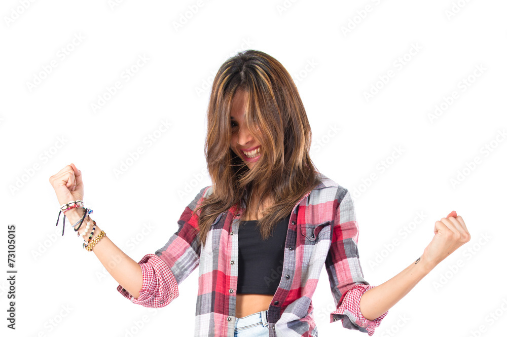 Obraz premium Lucky young girl over isolated white background