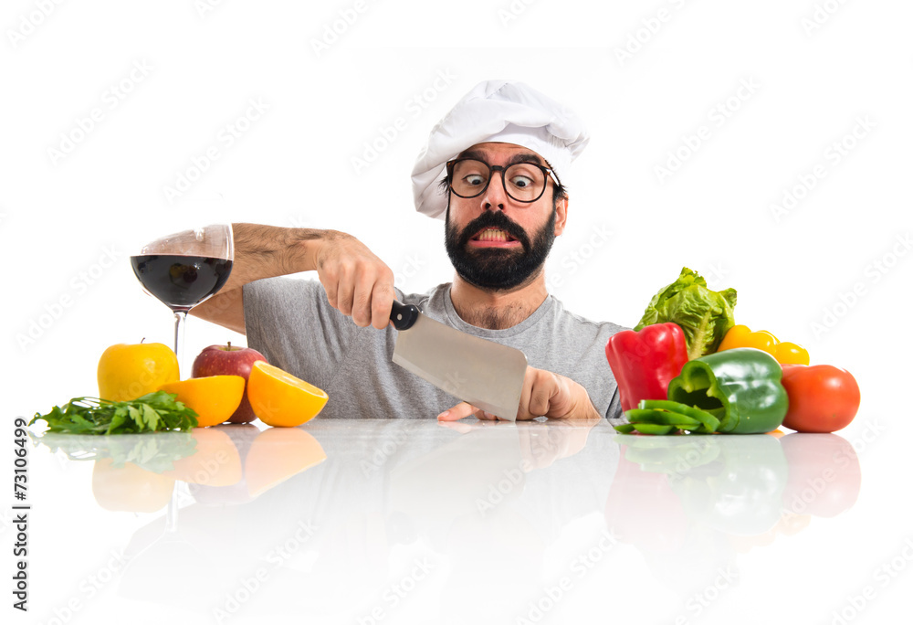 Crazy hipster chef cutting his finger