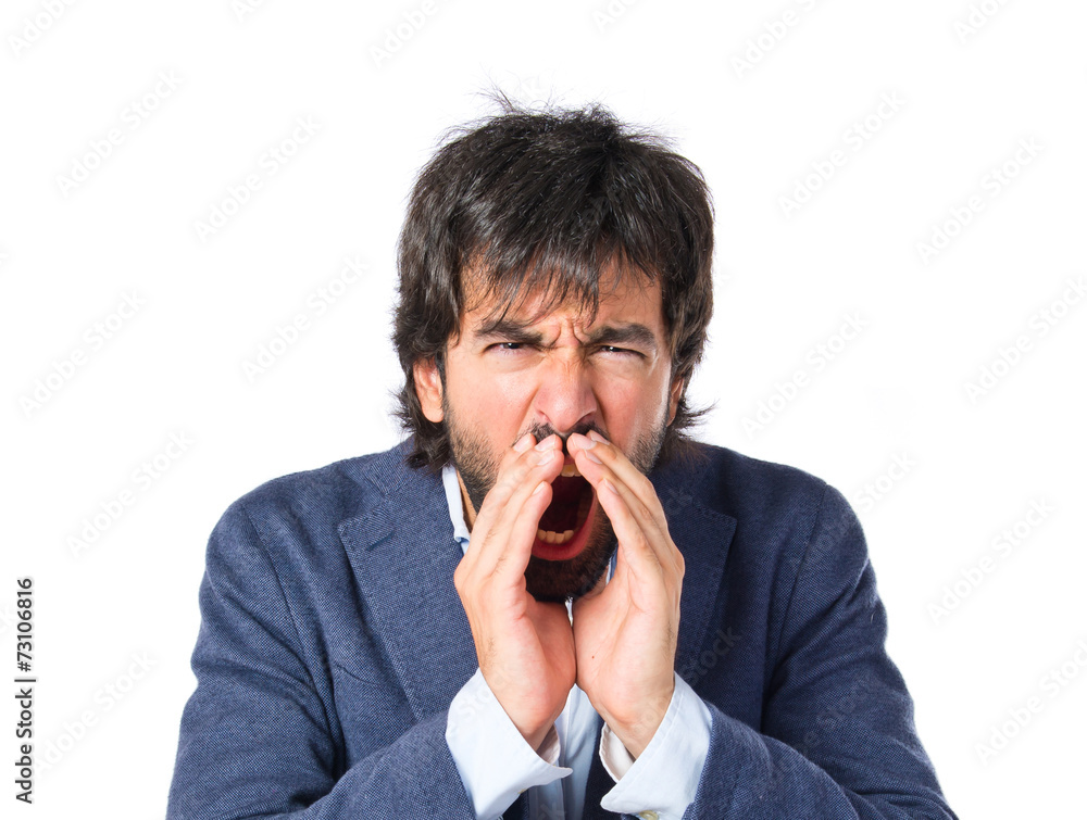 Businessman shouting over isolated white background Businessman shouting over isolated white background