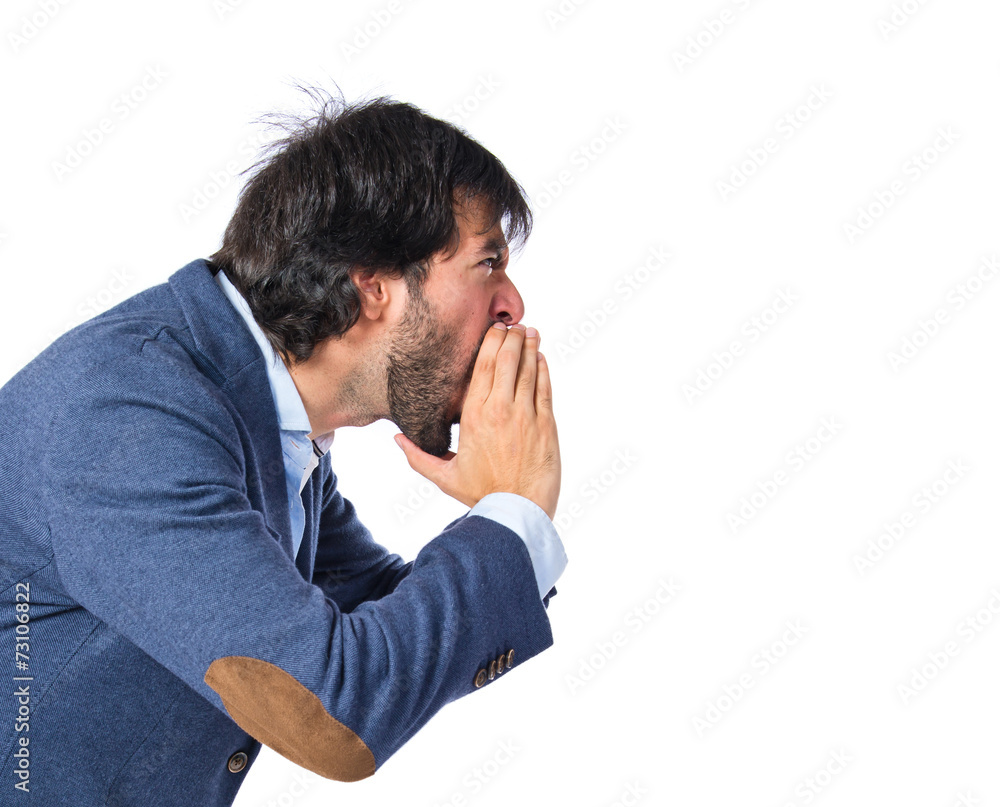 Businessman shouting over isolated white background Businessman shouting over isolated white background