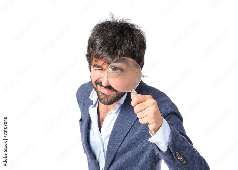 Man with magnifying glass over white background Man with magnifying glass over white background