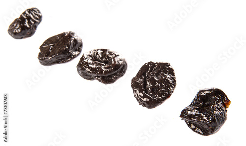 Dried plum or prune over white background