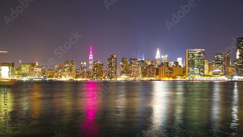 colored reflection manhattan night life 4k time lapse from nyc photo