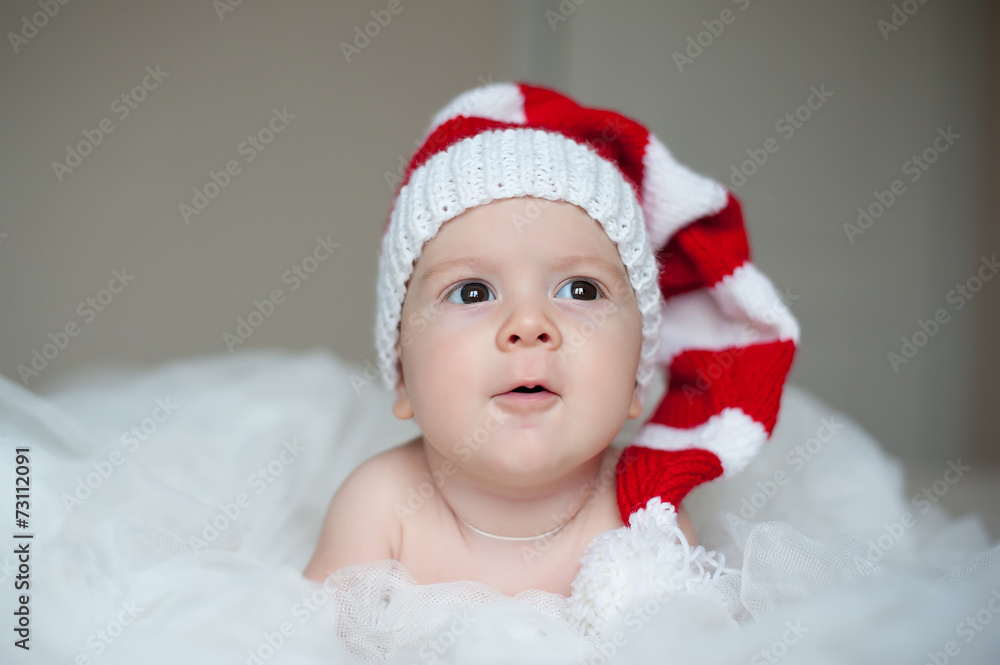 christmas cute baby boy/girl in Santa's hat christmas cute baby boy/girl in Santa's hat