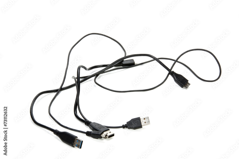 Three Isolated Black Intertwined USB Cables on White Three Isolated Black Intertwined USB Cables on White