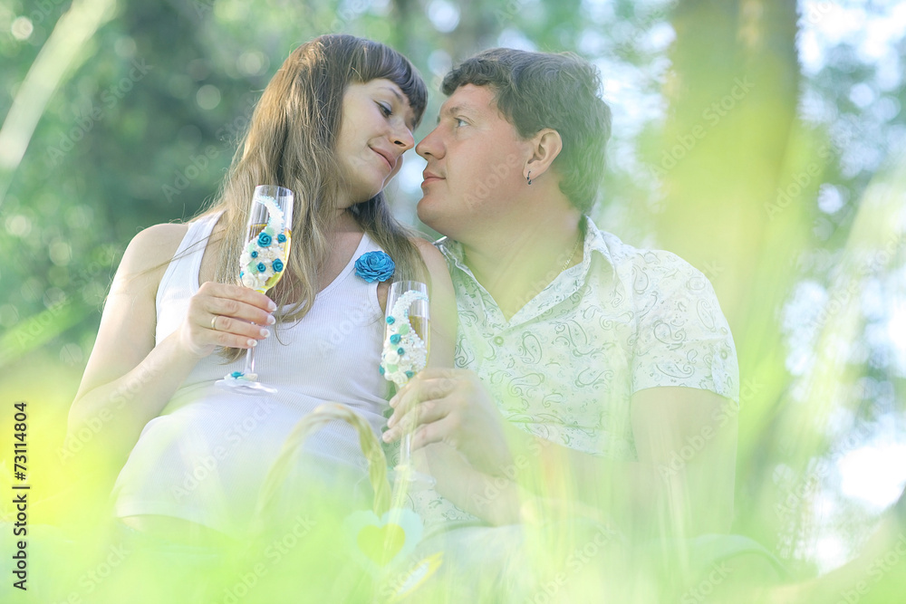 man and a pregnant woman happy nature man and a pregnant woman happy nature