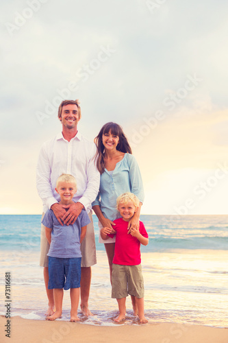 Happy Family with Two Young Kids