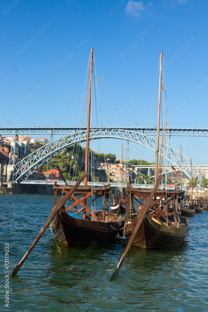 two rabelo boats and bridge of Dom Luis , Portugal