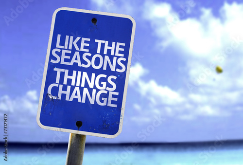 Like the Seasons Things Change sign with a beach