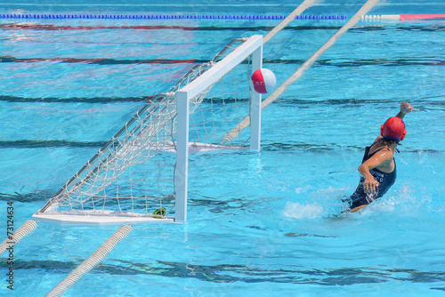 Obraz na plátně A water polo goalkeeper misses the ball going into the net of th