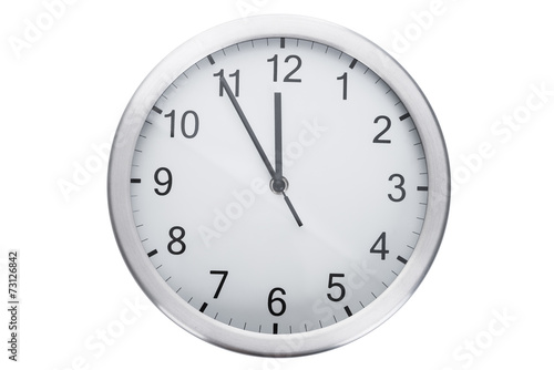 Clock Showing Five Minutes To Twelve