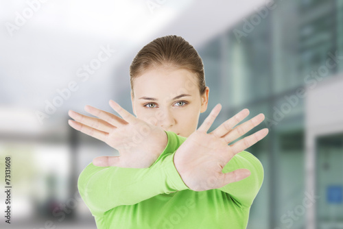 Woman making stop sign
