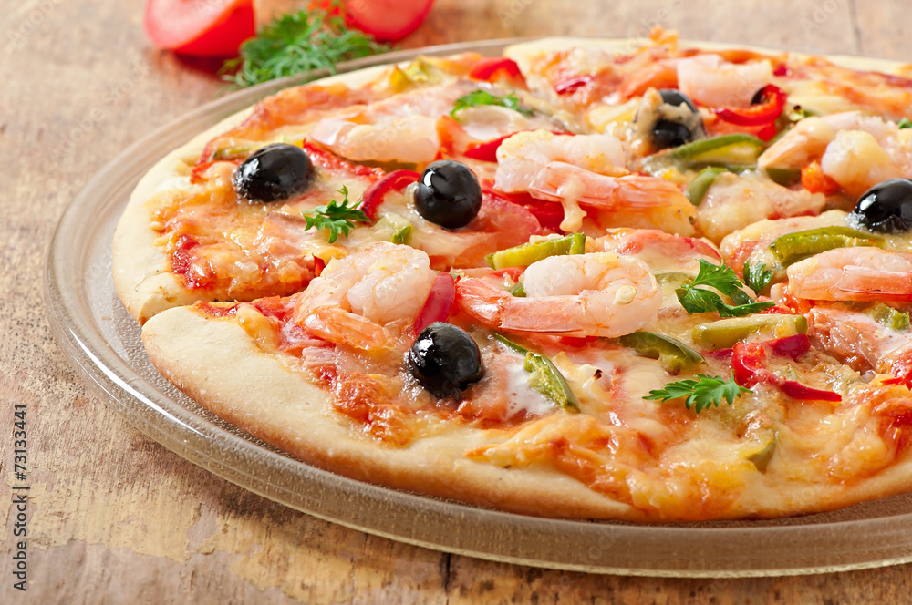 Pizza with shrimp, salmon and olives Pizza with shrimp, salmon and olives