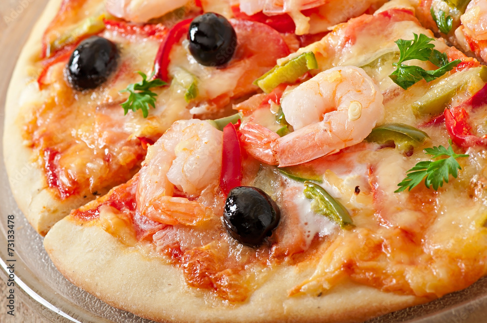 Pizza with shrimp, salmon and olives Pizza with shrimp, salmon and olives