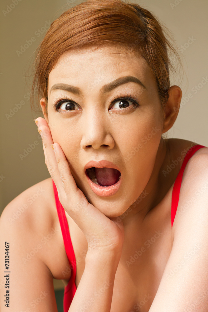 portrait of excited, surprised woman, jaw dropping portrait of excited, surprised woman, jaw dropping