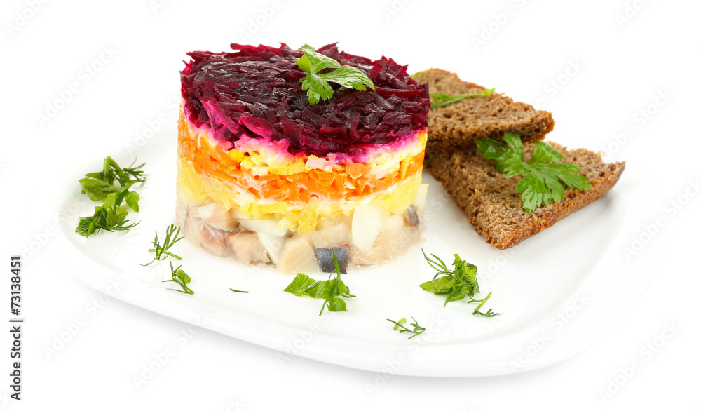 Russian herring salad on plate isolated on white Russian herring salad on plate isolated on white