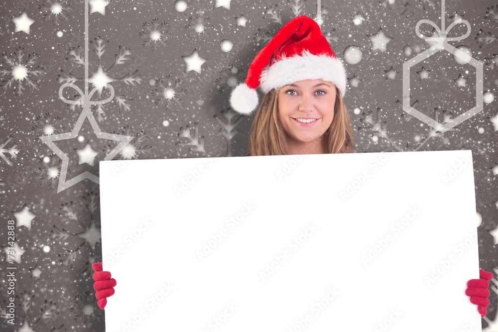 Festive blonde holding a poster Festive blonde holding a poster