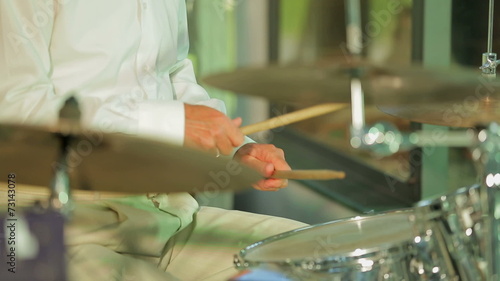 Drummer Playing His Insrument In Concert photo