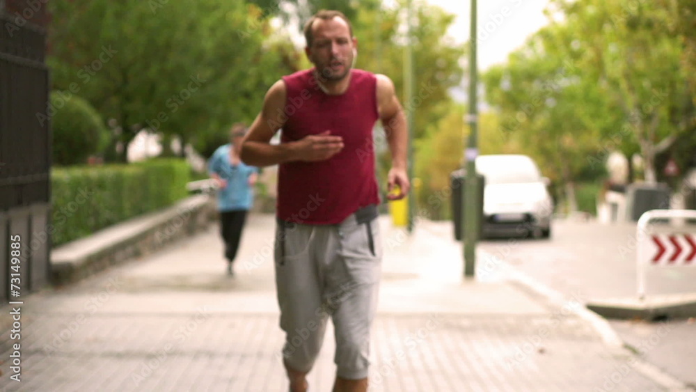 Man resting after running, slow motion shot at 240fps, steadycam Man resting after running, slow motion shot at 240fps, steadycam
