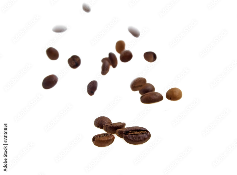 Flying coffee beans on a white background Flying coffee beans on a white background