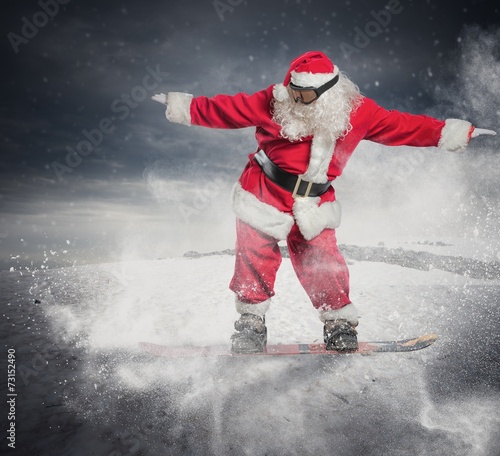 Santa Claus with snowboard
