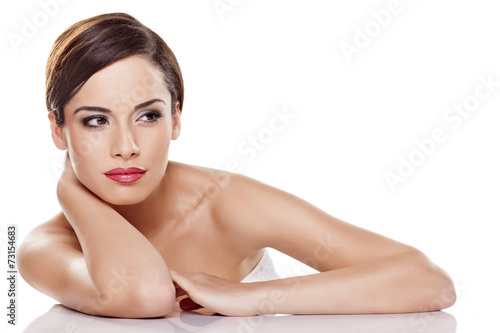 young beautiful woman posing on a white background #73154683