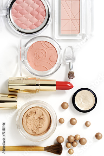 cosmetics on white with light shadows