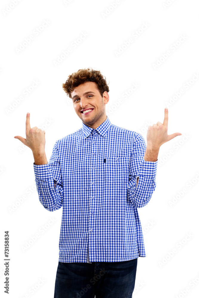 Happy man standing with fingers up over white background Happy man standing with fingers up over white background