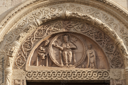 Billede på lærred Tympanon ob Portal der Kirche San Rufino in Assisi, Umbrien, Italien