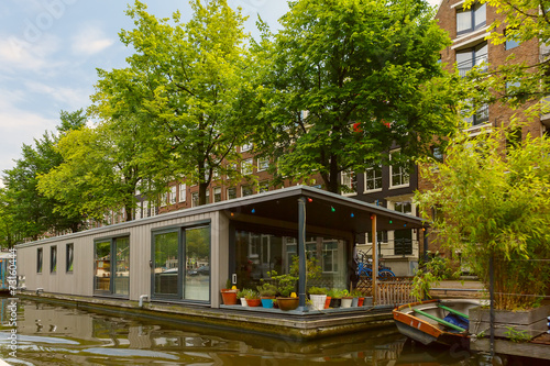 Photography City view of Amsterdam canal and houseboat, Holland, Netherlands