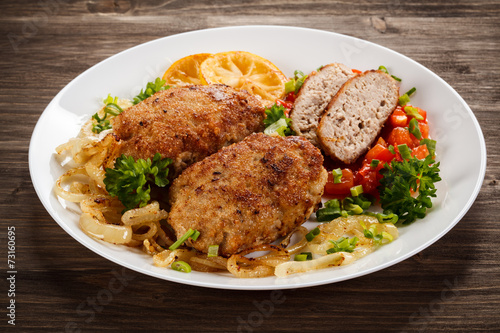 Fried chops and vegetable salad