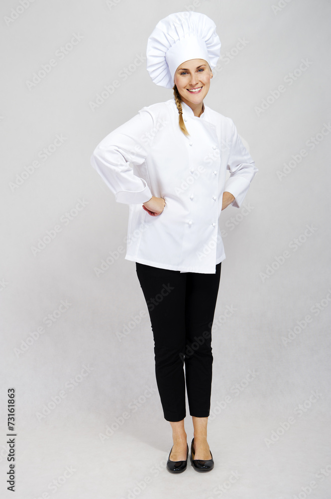 Young professional chef woman. Isolated over white background