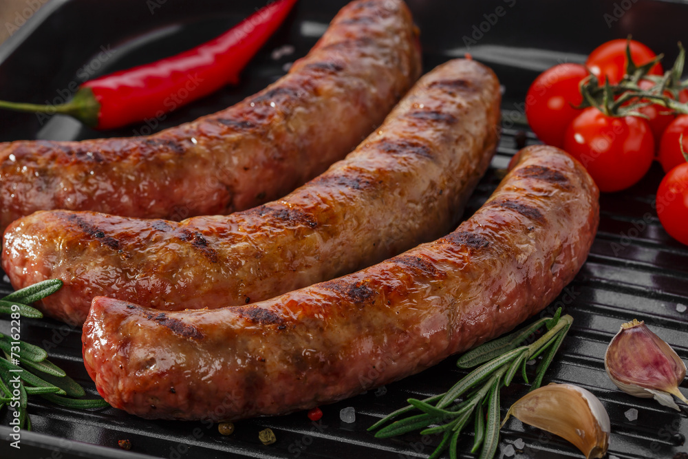 grilled sausages in a pan grilled sausages in a pan