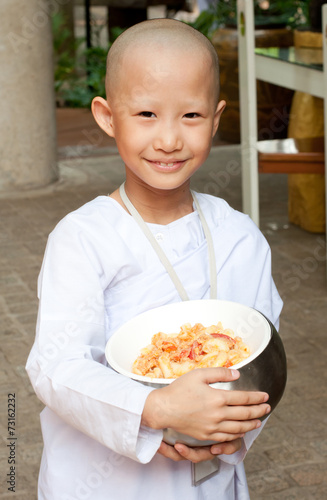 a little nun in a Buddhist temple