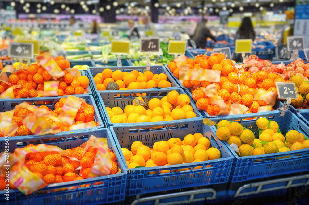 Various citrus fruits in supermarket