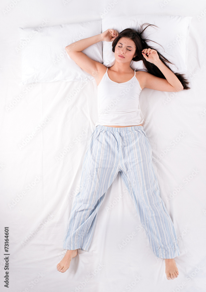 Naklejka premium Woman sleeping in free fall position