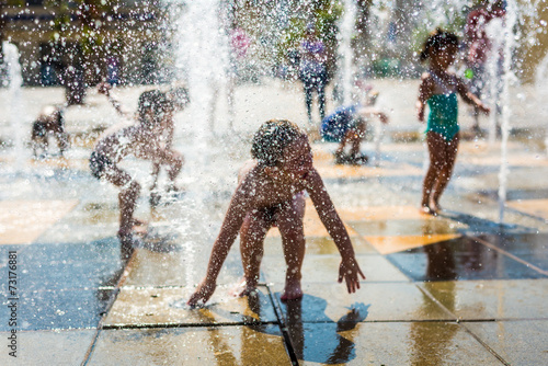 Kids playing at fountain