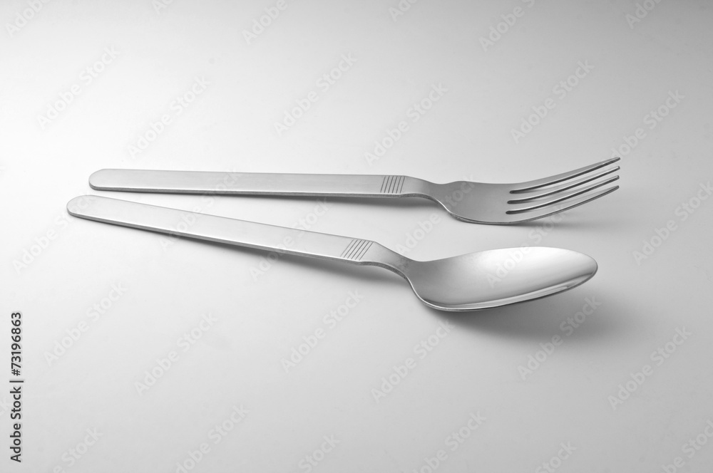 Fork and spoon on white background Fork and spoon on white background