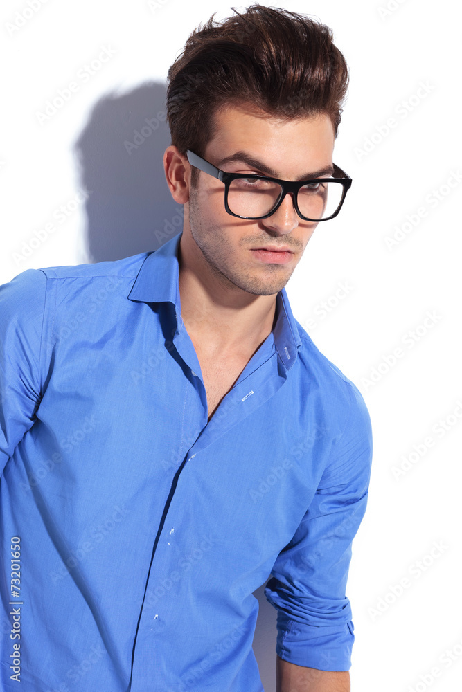 young attractive business man looking down. young attractive business man looking down.